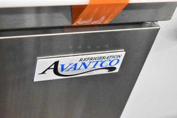 Brand new Avantco 178APT48HC stainless steel commercial sandwich prep table, scratch and dent condition, 115V, 1 Phase.