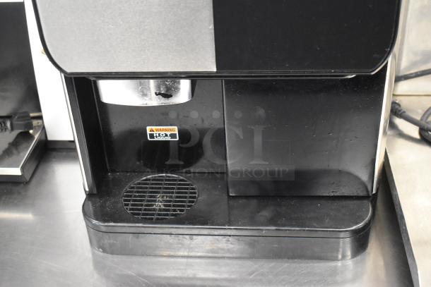 Bunn Crescendo 44300.0201 stainless steel coffee brewer, bean to cup, countertop, 120V, commercial use, warning label visible.