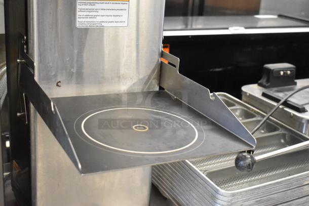 Bunn ITCB-DV stainless steel iced tea machine, with poly brew basket. Features 120 volts, 1 phase; countertop model.