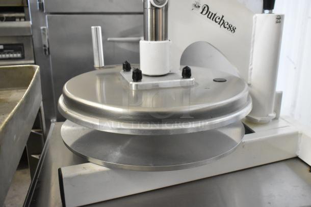 Dutchess DoughXpress DMS-18 NH metal dough press, commercial countertop model, mounted on metal pan rack with casters.