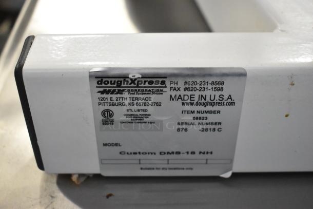 Dutchess DoughXpress DMS-18 NH dough press label, shows contact info, model, item, and serial number. Made in USA.