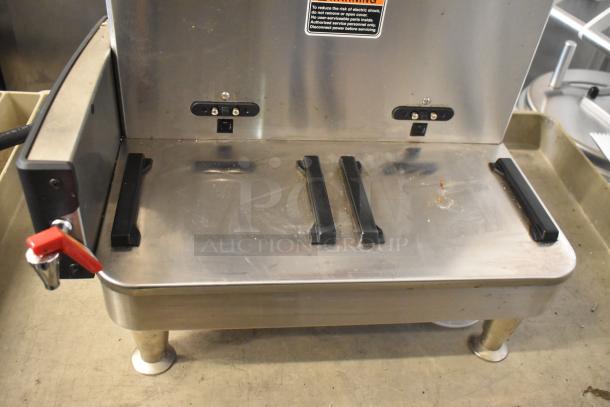 2023 Bunn ICB TWIN SH stainless steel coffee machine, dual brewers, with hot water dispenser, visible warning label.