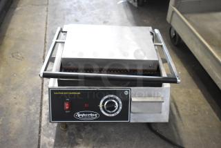 Superior SPGM1 stainless steel commercial countertop panini press, 120V, 1 phase. Features temperature dial and caution label.