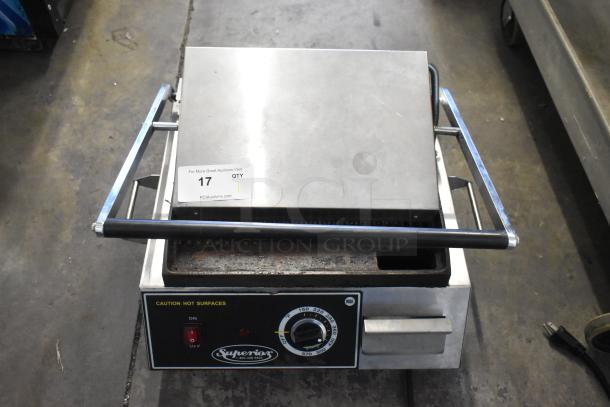 Superior SPGM1 stainless steel commercial panini press, 120V, visible wear, caution label, Superior logo, auction tag no. 17.