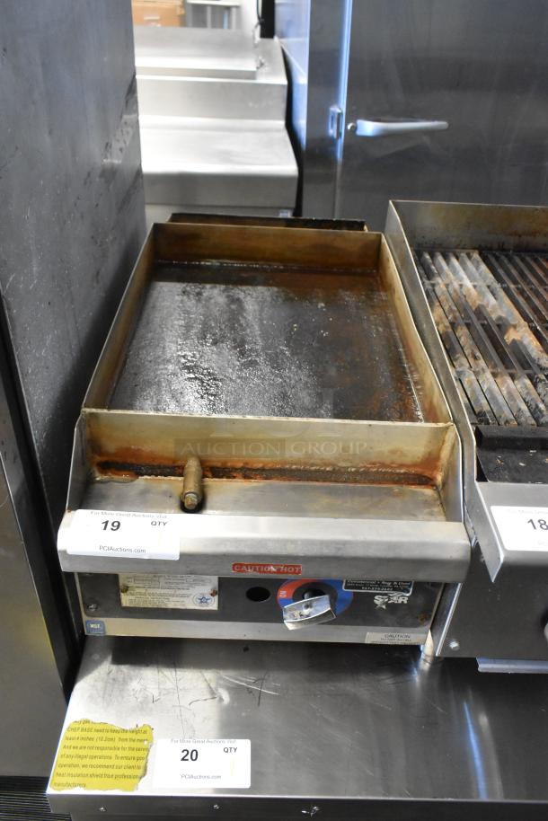 Star 615-MP Stainless Steel Gas Griddle, 20,000 BTU. Used condition, visible wear on the flat top. Labels: "Caution Hot."