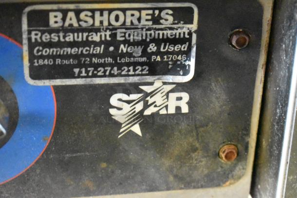 Star 615-MP stainless steel griddle, 20,000 BTU, lightly worn condition. Bashore’s equipment tag visible.
