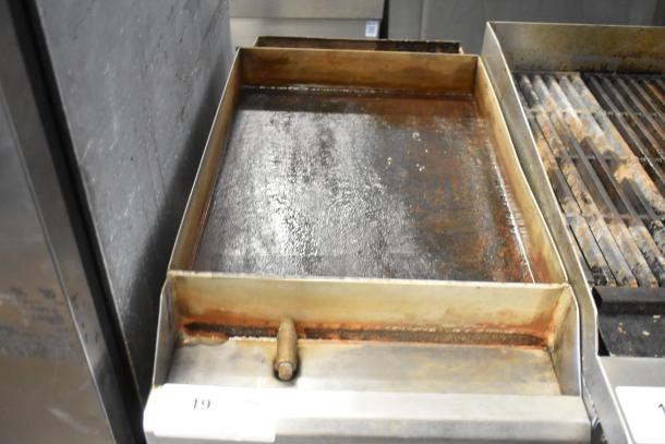 Star 615-MP stainless steel gas griddle, prominently used. 20,000 BTU. Ideal for commercial kitchen use, countertop model.