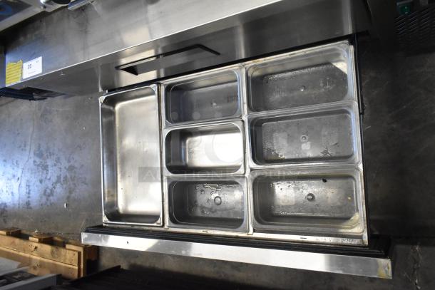 2018 Atosa MGF8451GR stainless steel 2-drawer chef base on commercial casters, 115V, 1 phase, with pans, used condition.