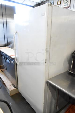 Frigidaire FFRU17B2QWE single door reach-in cooler, metal exterior, 115 volts, 1 phase, visible wear, spacious interior.