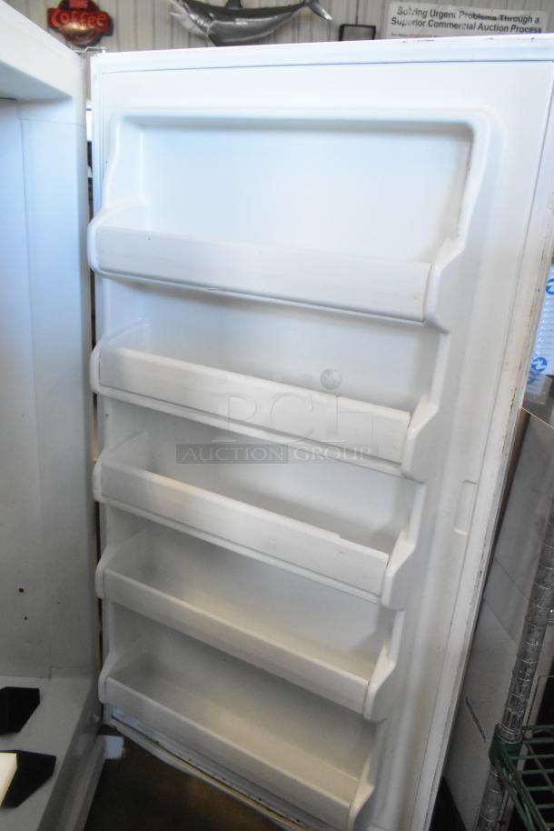 Frigidaire FFRU17B2QWE single door cooler, metal, 115 volts, 1 phase, interior door shelving, clean condition.