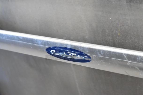 Cook Rite stainless steel range logo, marking its authenticity.