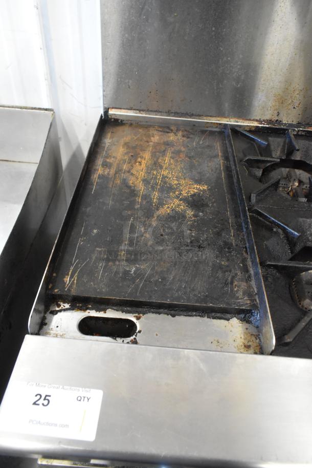 Cook Rite stainless steel commercial gas range with 4 burners, flat top griddle, oven, overshelf, and backsplash on casters.