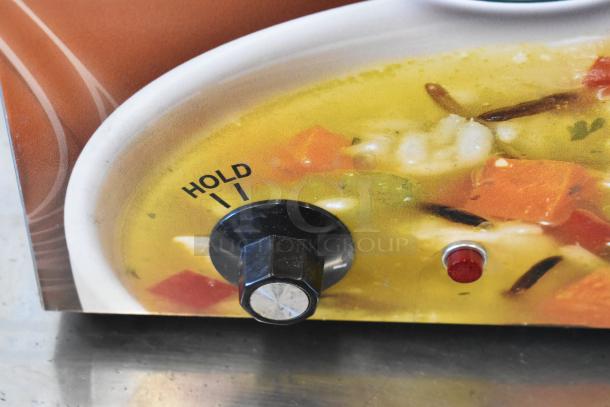Duke CSW-2-T-AM stainless steel food warmer control panel, showing dial with "Hold" setting and indicator light.