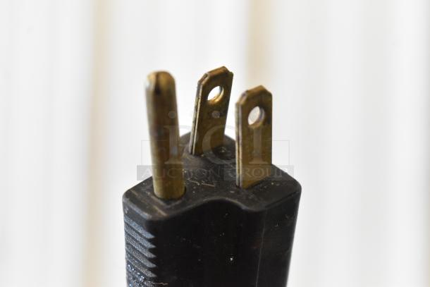 A close-up of a three-prong plug for the Duke CSW-2-T-AM commercial food warmer, 120 Volts, 1 Phase.