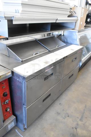 Delfield stainless steel prep table, Bain Marie mega top, four drawers, over shelf. 115V, 1-phase. Clean condition.