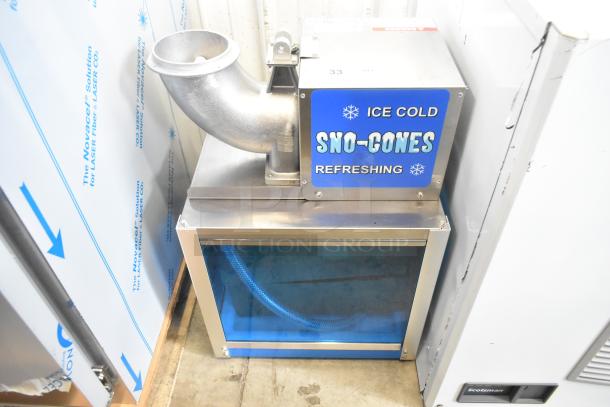 Brand new Paragon 6133310 Arctic Blast Snow Cone Machine, top mount ice shaver, metal construction, 115V, labeled "Ice Cold Sno-Cones."
