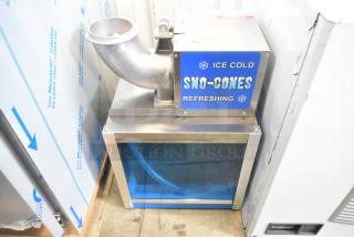 Brand new Paragon 6133310 Arctic Blast Snow Cone Machine, top mount ice shaver, metal construction, 115V, labeled "Ice Cold Sno-Cones."