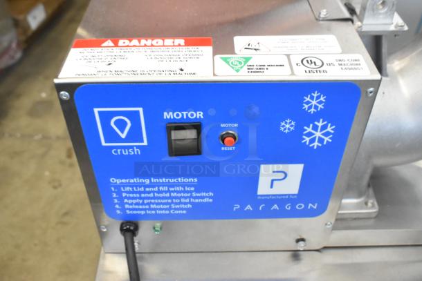 Brand new Paragon 6133310 Arctic Blast Snow Cone Machine, metal, with ice shaver. Labels show 115V, 1 phase; includes instructions.