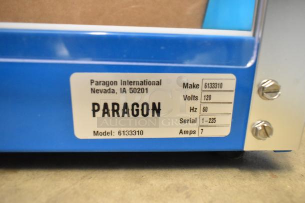 Paragon 6133310 Arctic Blast Snow Cone Machine, 115V, metal, visible label with model and electrical info, new condition.