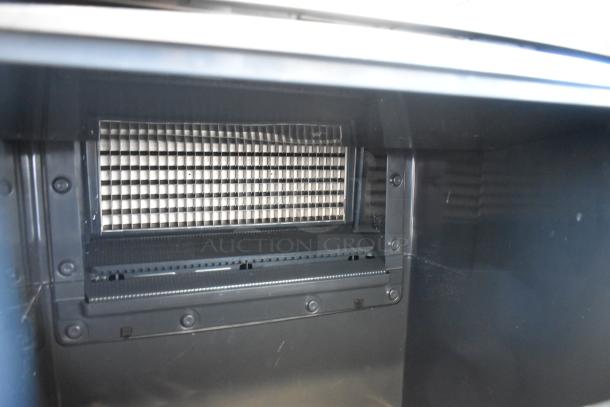 BRAND NEW 2023 Scotsman UC2024MA-1A undercounter ice machine interior, 282 lb capacity, small cube production, 115V, 1 phase.