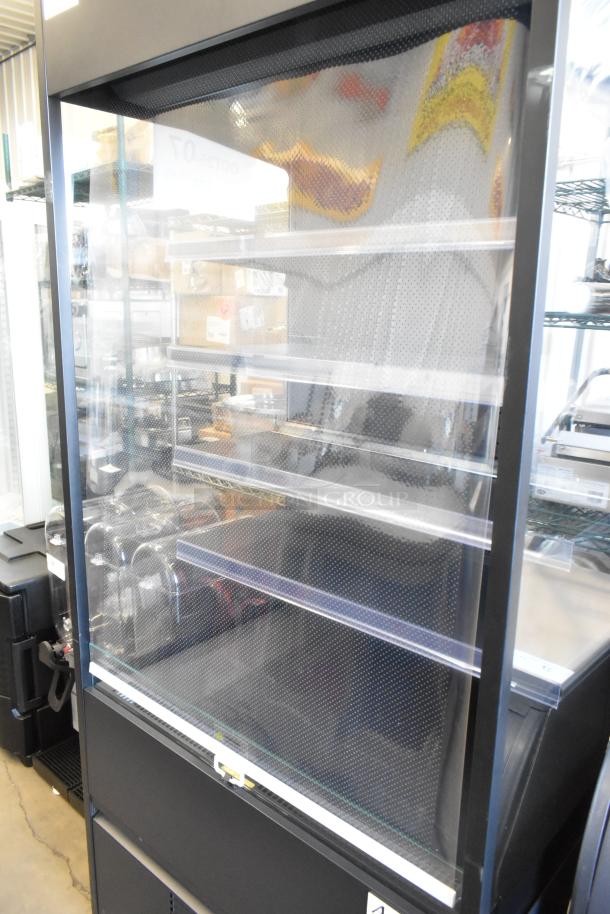 Brand new Avantco 193VOA36B black vertical open air merchandiser with LED lighting and commercial casters. Scratch and dent model.