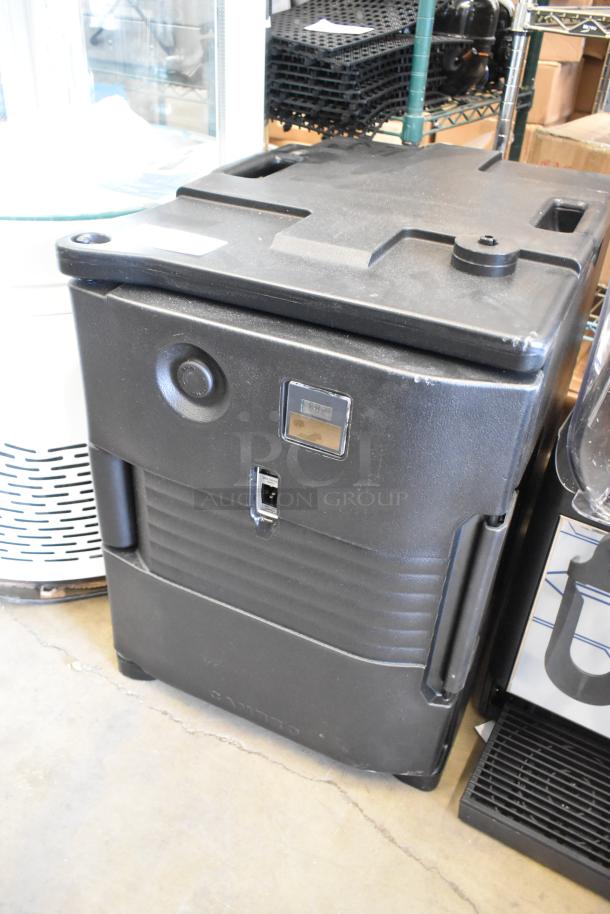 Brand new Cambro CAM6000 gray poly heated holding case, 120V, 1 phase, visible control panel, minor scratches and dents.