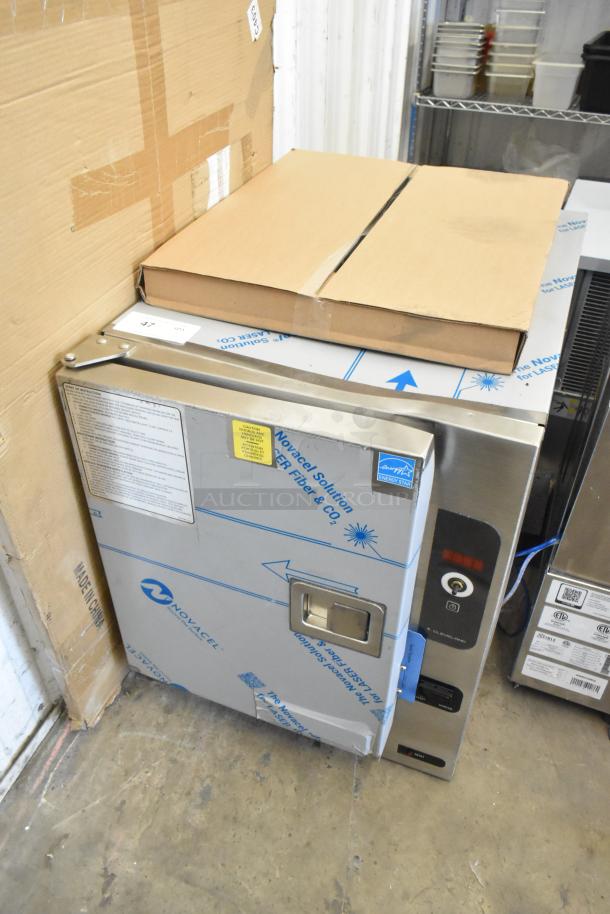 BRAND NEW Cleveland 22CET6.1 SteamChef stainless steel 6-pan steamer. Scratch and dent, door issue. 208/240V, 3 phase.
