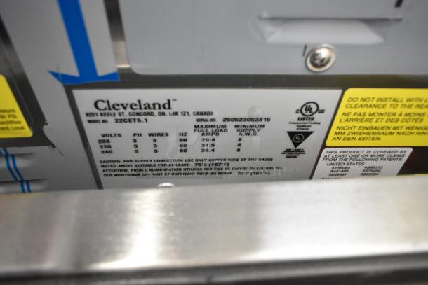 Cleveland 22CET6.1 SteamChef label showing specs; 208/240V, 3-phase, UL listed; door defect noted.