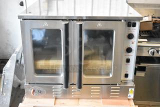 BRAND NEW Cooking Performance Group FEC-100-C stainless steel convection oven, view doors, metal racks, thermostatic controls.