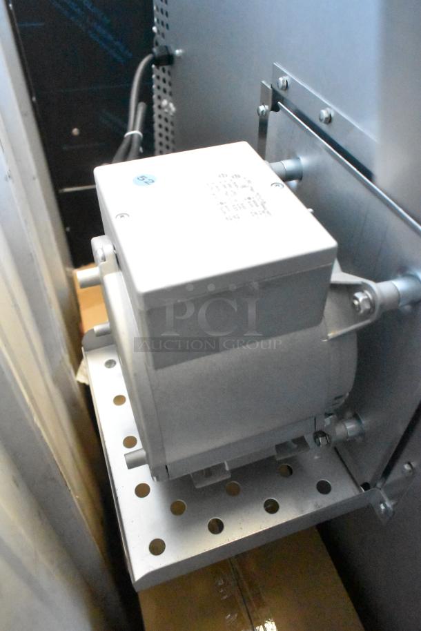 Stainless steel commercial convection oven component from Cooking Performance Group, model FEC-100-C, brand new with minor scratch.