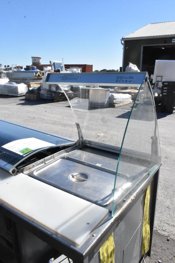 Duke stainless steel commercial subway sandwich make line with lowering sneeze guard, 120 volts, 1 phase.