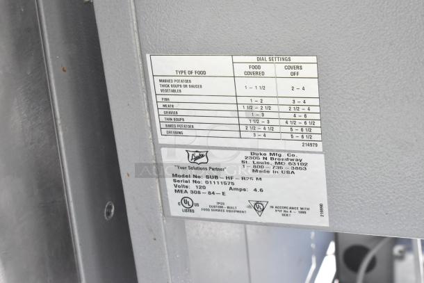 Duke Stainless Steel Sandwich Prep Line with lowering sneeze guard. Label shows model SUB-HF-R25 M, 120V, 4.6 amps.
