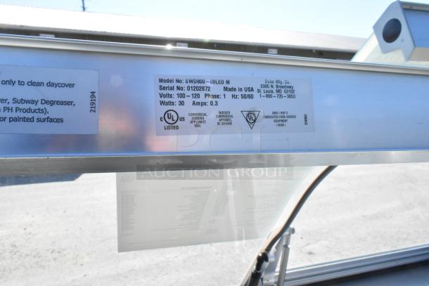 Duke stainless steel commercial prep line with lowering sneeze guard, Model SWD800-60LED M. 120V, 1 phase, UL listed.