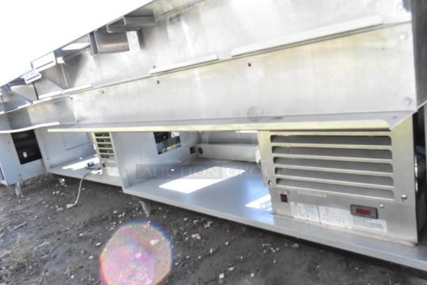 Duke Stainless Steel Commercial Prep Line with lowering sneeze guard, 120V, 1 Phase, visible vents and labeling.