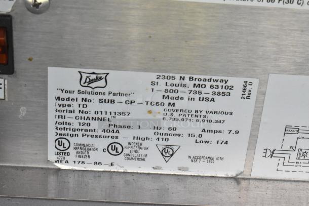 Duke stainless steel commercial sandwich prep line with lowering sneeze guard. Model SUB-CP. 120V, 1 Phase, Serial No. 01111357. Made in USA.