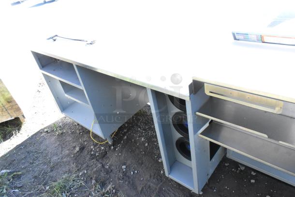 Duke stainless steel commercial sandwich prep line with lowering sneeze guard and storage, 120V, 1 Phase, used condition.