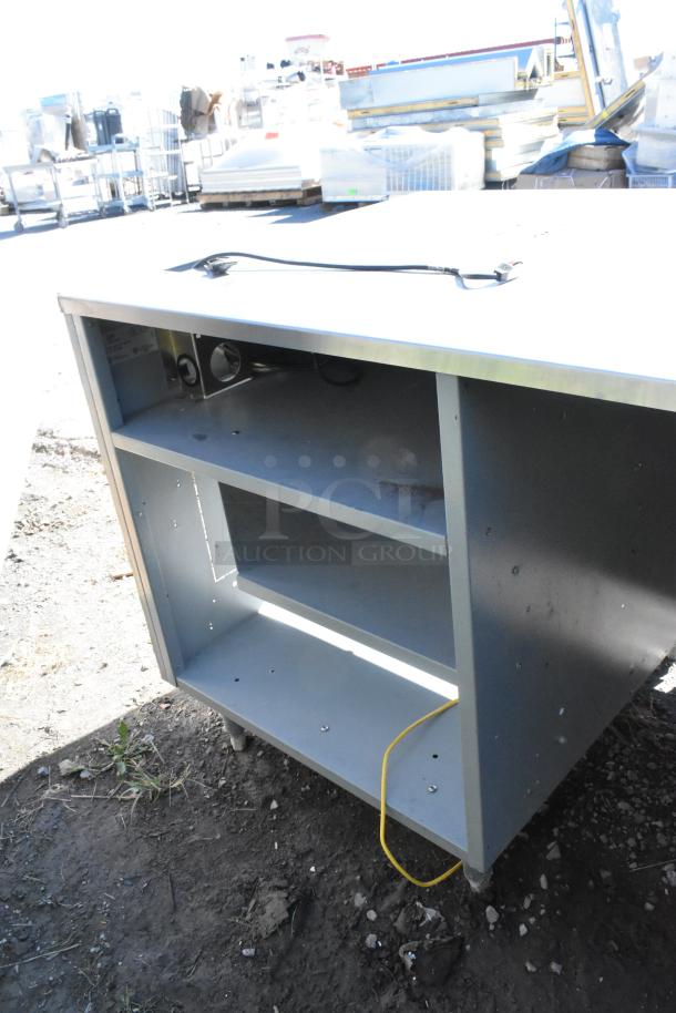 Duke Stainless Steel Subway Sandwich Prep Line with lowering sneeze guard. 120V, 1 phase. Shelves shown, outdoor condition.