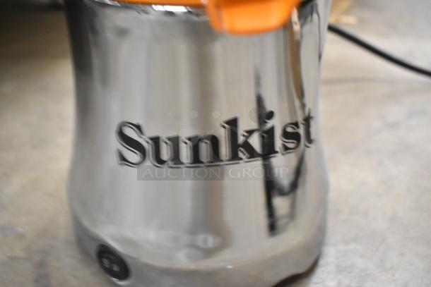 BRAND NEW SCRATCH AND DENT! Sunkist PJF-A12959 Black Pro Series Citrus Juicer, 115 Volts, 1 Phase, visible "Sunkist" logo.