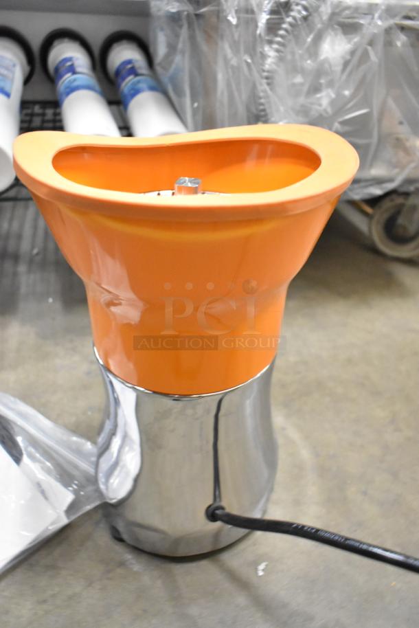 Brand new Sunkist PJF-A12959 black citrus juicer; 115V, 1 phase. Visible scratches and dents on body.