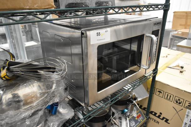 Solwave stainless steel commercial microwave oven, brand new, minor scratches. Features a digital display and side handle. Model label visible.