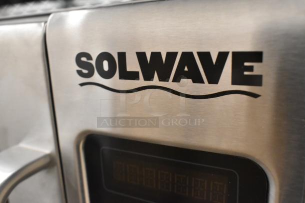 Brand new Solwave stainless steel commercial microwave, visible scratch and dent, digital display, sturdy handle.