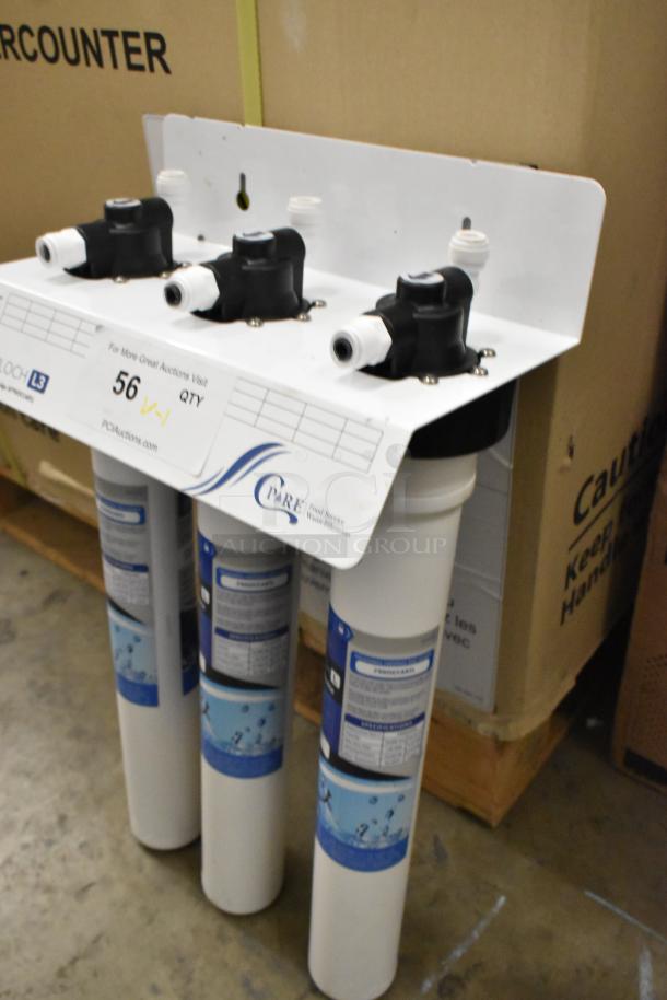 BRAND NEW C Pure Oceanloch L3 triple water filtration system, 1 micron, 5 GPM, with cartridges and outlet pressure gauge.