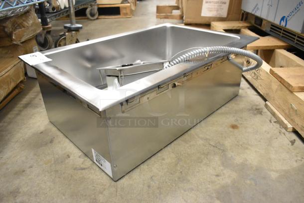 Brand new Avantco 177TM12B hot food well, 208V, 1-phase, stainless steel with round inside corners and drain. Scratch and dent.