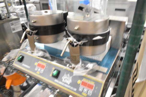 Brand new Carnival King 382WBM26DGT stainless steel double Belgian waffle maker with digital timer and temperature controls.