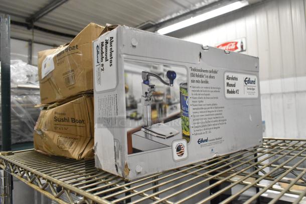 Boxed Edlund 12000 Old Reliable #2 Manual Can Opener on shelf, packaging slightly dented; visible Edlund branding.