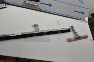 Seven brand new scratch and dent squeegee heads, models 36632400 and 27140072, on a white surface.