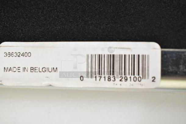 Seven brand new scratch and dent squeegee heads, including models 36632400 and 27140072, with labels indicating "Made in Belgium."