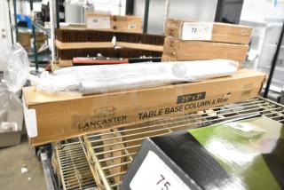 Two boxes of Lancaster Table & Seating 25" table base columns and rods, new scratch and dent condition, on a shelf.