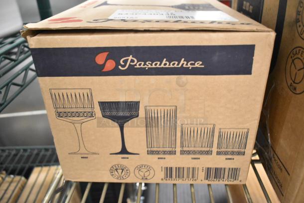 Cardboard box of Pasabahce Elysia Coupe Glasses, 9 oz., 6 per case, from Steelite International. Brand new, scratch and dent condition.