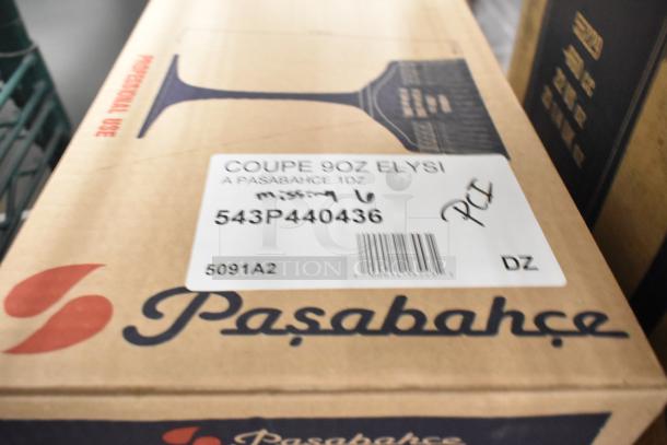 Cardboard box with label reading "COUPE 9OZ ELYSI," "543P440436," containing Pasabahce Elysia 9 oz. coupe glasses, 6 per case.